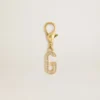 Buchstaben-G-Anhänger aus goldfarbenem Messing mit Kristallen