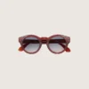 Cameron Panthos Sonnenbrille mit honigfarbenem Rahmen, Edelsteinen und blauen Gläsern