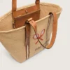 24,7 Tote aus naturbelassener Raffia und braunem Leder mit goldenen Metalldetails