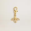 Anhänger in Bienenform aus goldfarbenem Messing mit Kristallen
