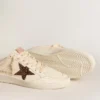 Ball Star Sabots aus elfenbeinfarbenem Nappaleder mit bronzefarbenem Glitzerstern