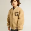 Beigefarbene Fleece-Bomberjacke für Kinder