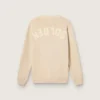 Beigefarbene Herren-Strickjacke mit „Golden“-Schriftzug auf der Rückseite
