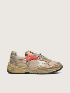 Herrenmodell „Dad-Star“ aus goldlaminiertem Leder und Mesh mit weißem Lederstern und goldener Lederlasche an der Ferse