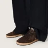 Damen-Modell „Ball Star“ aus braunem Wildleder mit braunem Lederstern und Fersenlasche