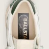 Damen-Modell „Ball Star LTD“ aus weißem Leder mit grünem Stern und Lederwaren