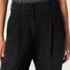Damenhose aus schwarzem Baumwoll-Denim mit Used-Look