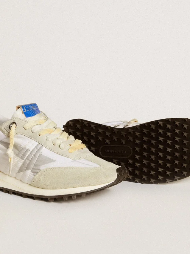 Damenmodell „Marathon“ mit weißem Nylon-Obermaterial und silbernem Stern