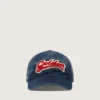 Denimblaue Baseballkappe mit rot-weißem „Golden“-Aufnäher aus Frottee