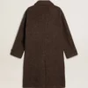 Einreihiger „Journey“-Herrenmantel aus knitterfreier Wollmischung mit Blumenanstecker