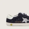 Junior Old School aus blauem Wildleder mit silbernem Glitzerstern und weißer Lederlasche an der Ferse