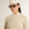 Kurzer Pullover mit Rundhalsausschnitt aus beiger Wolle mit durchgehender Kristallverzierung