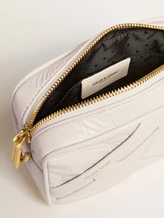 Mini Star Bag aus butterweißem Leder mit Ton-in-Ton-Stern