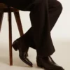 Niedrige „Wish Star“-Stiefel aus schwarzem Leder mit Ton-in-Ton-eingearbeitetem Stern