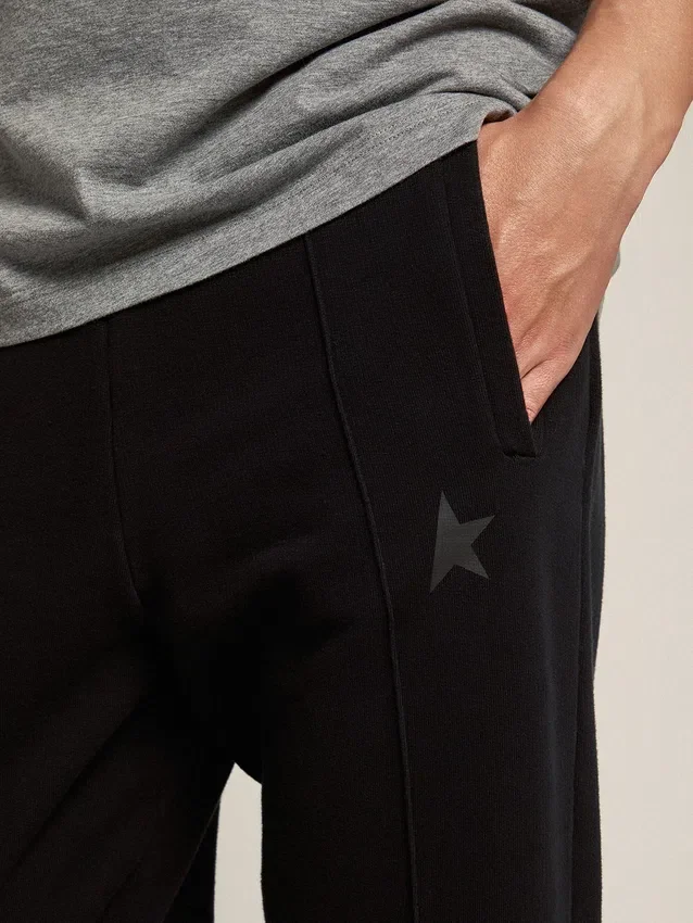 Schwarze Herren-Jogginghose mit Stern auf der Vorderseite