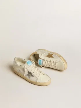 Super-Star aus weißem Leder und Wildleder mit silbernem und goldenem Lederstern