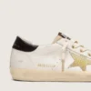 Super-Star für Damen aus weißem Leder mit goldenem Swarovski-Stern