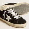Super-Star LTD für Damen aus schwarzem Wildleder mit weiß aufgedrucktem Stern und silberner Glitzer-Fersenlasche