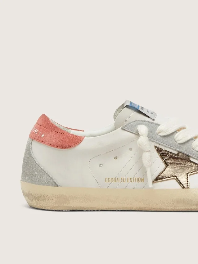 Super-Star LTD für Damen aus weißem Leder mit metallisch-bronzenem Stern