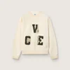 Unisex-Baumwoll-Sweatshirt „Star“ in Vintage-Weiß mit gestickten VCE-Aufnähern