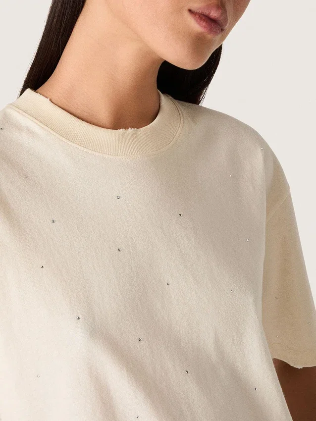 Unisex-Hemd „Star“ aus weißer Baumwolle mit durchgehenden Kristallen im Farbverlauf und Aufdruck auf der Rückseite