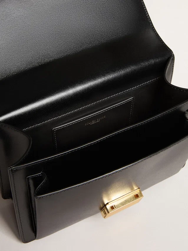 Venezia-Tasche aus schwarzem, geprägtem Leder mit goldenen Details