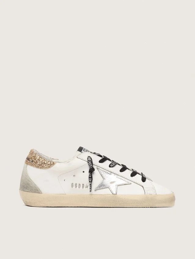 Weiße Super-Star-Damenschuhe aus Leder mit glitzernder Fersenlasche