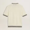 Weißes, im Used-Look gehaltenes Strick-Poloshirt für Herren mit blauen Rippbündchen